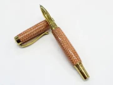 Diamond knurl rollerball with braided copper in clear resin